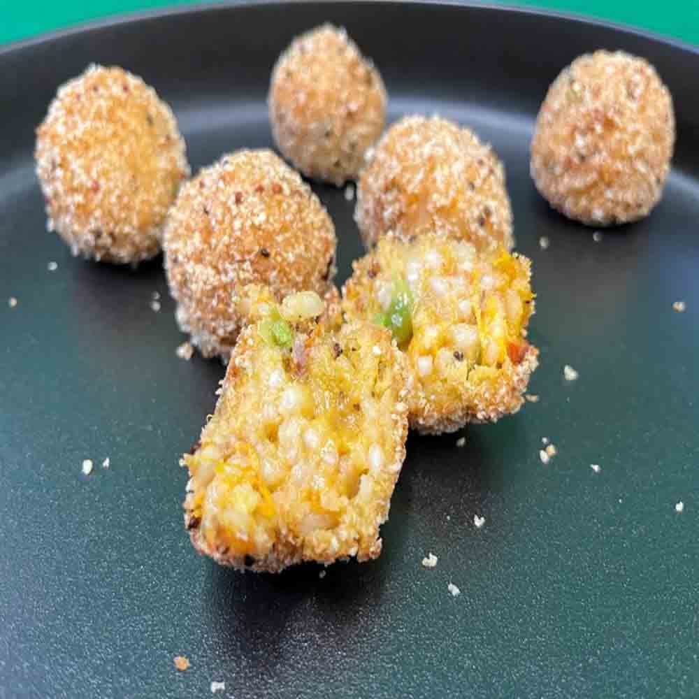 Arancini with Pumpkin, Sun-Dried Tomato, Pea