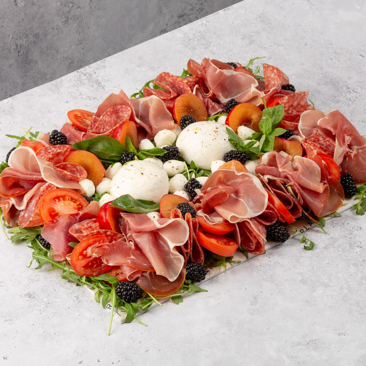 Caprese Salad with Burrata, Prosciutto and Olives