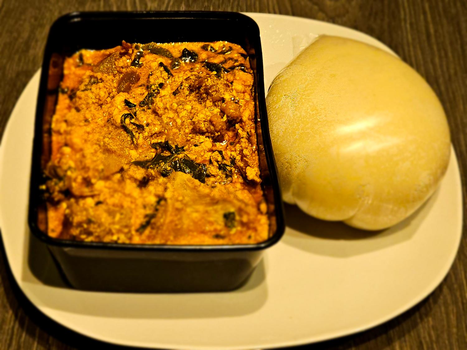 Pounded yam and Egusi (melon seed) soup (Beef)	