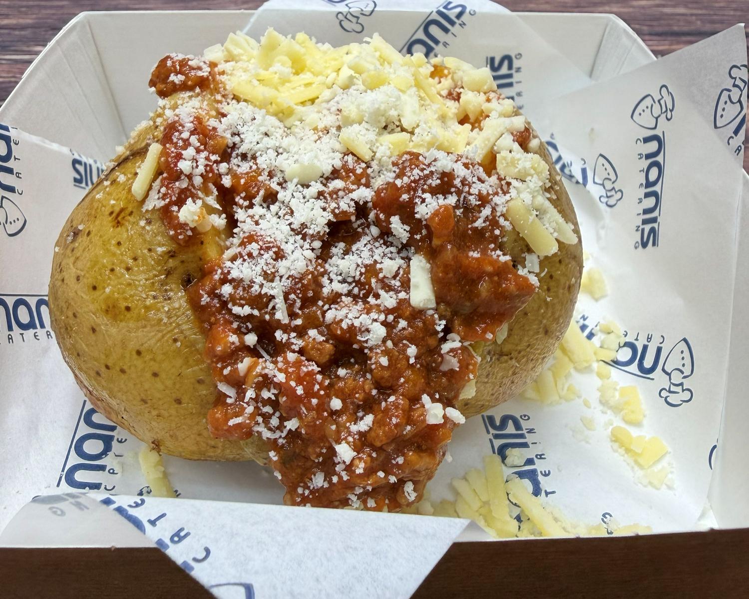 Jacket potato with bolognese & cheese