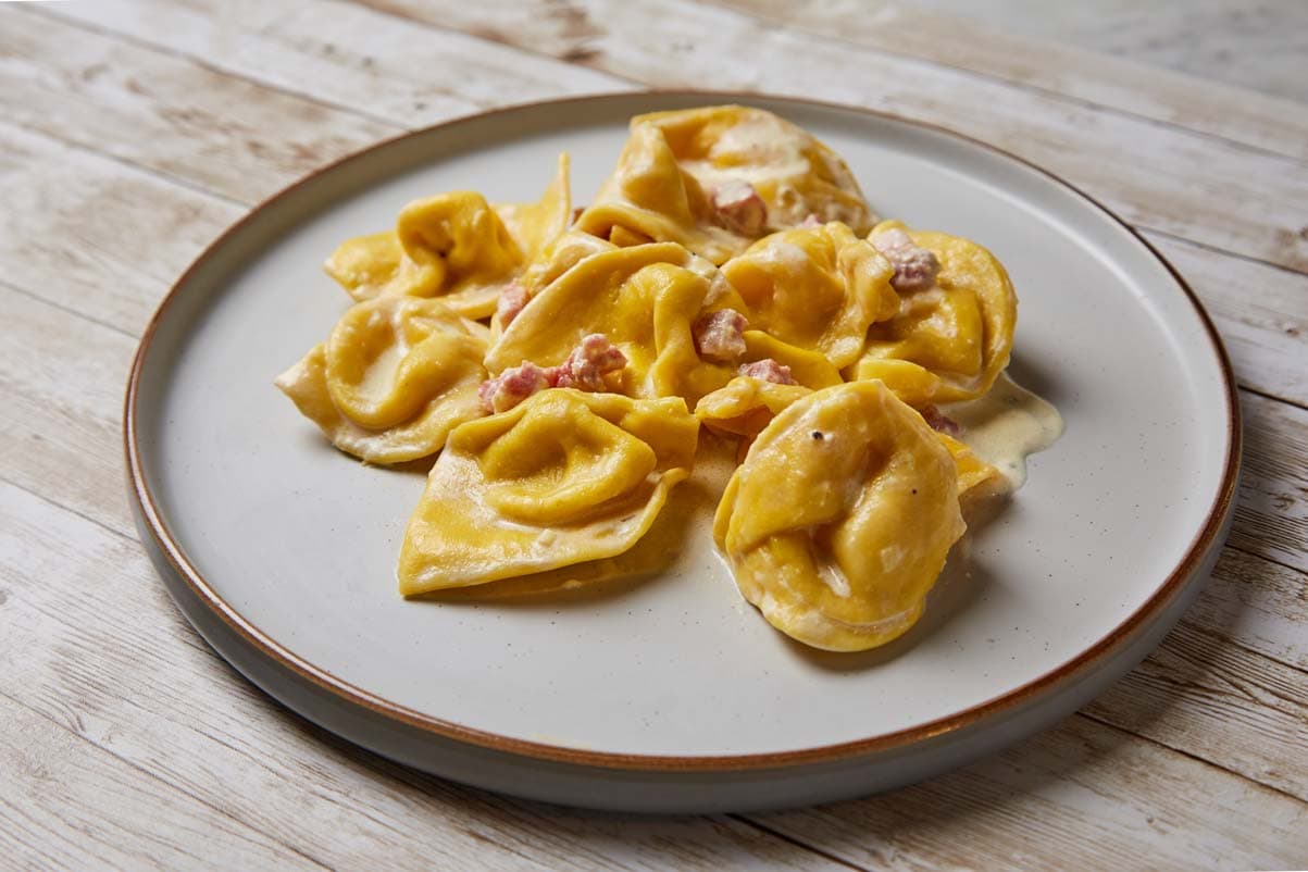Cappellacci burrata sundried tomatoes sausages