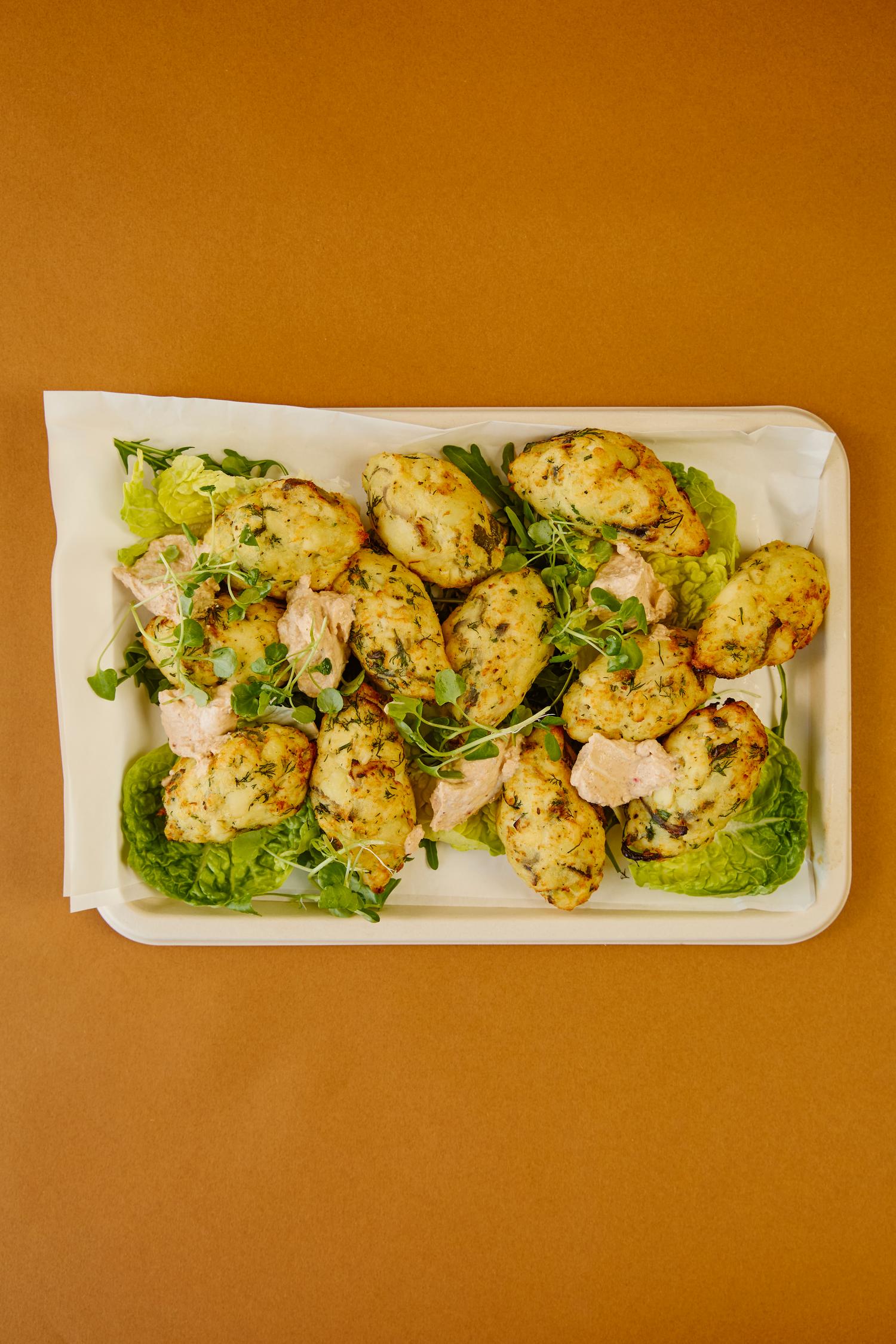 Herby cod cakes & spiced yoghurt platter