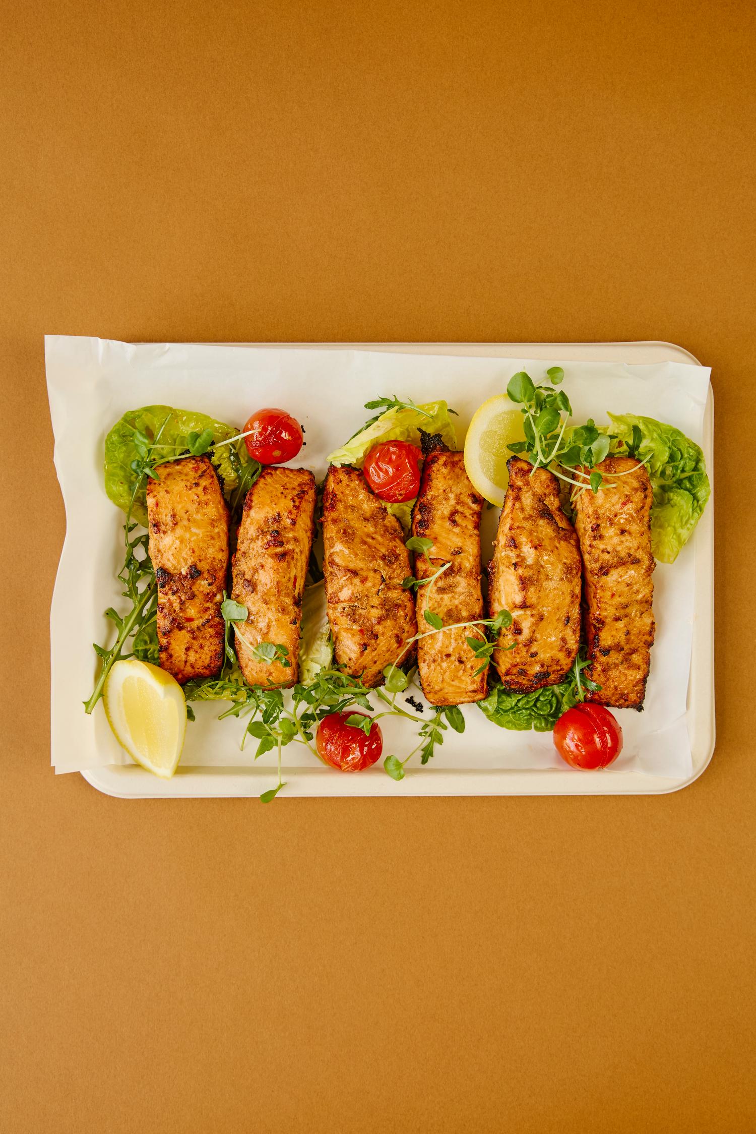 Harissa salmon, burst tomatoes platter