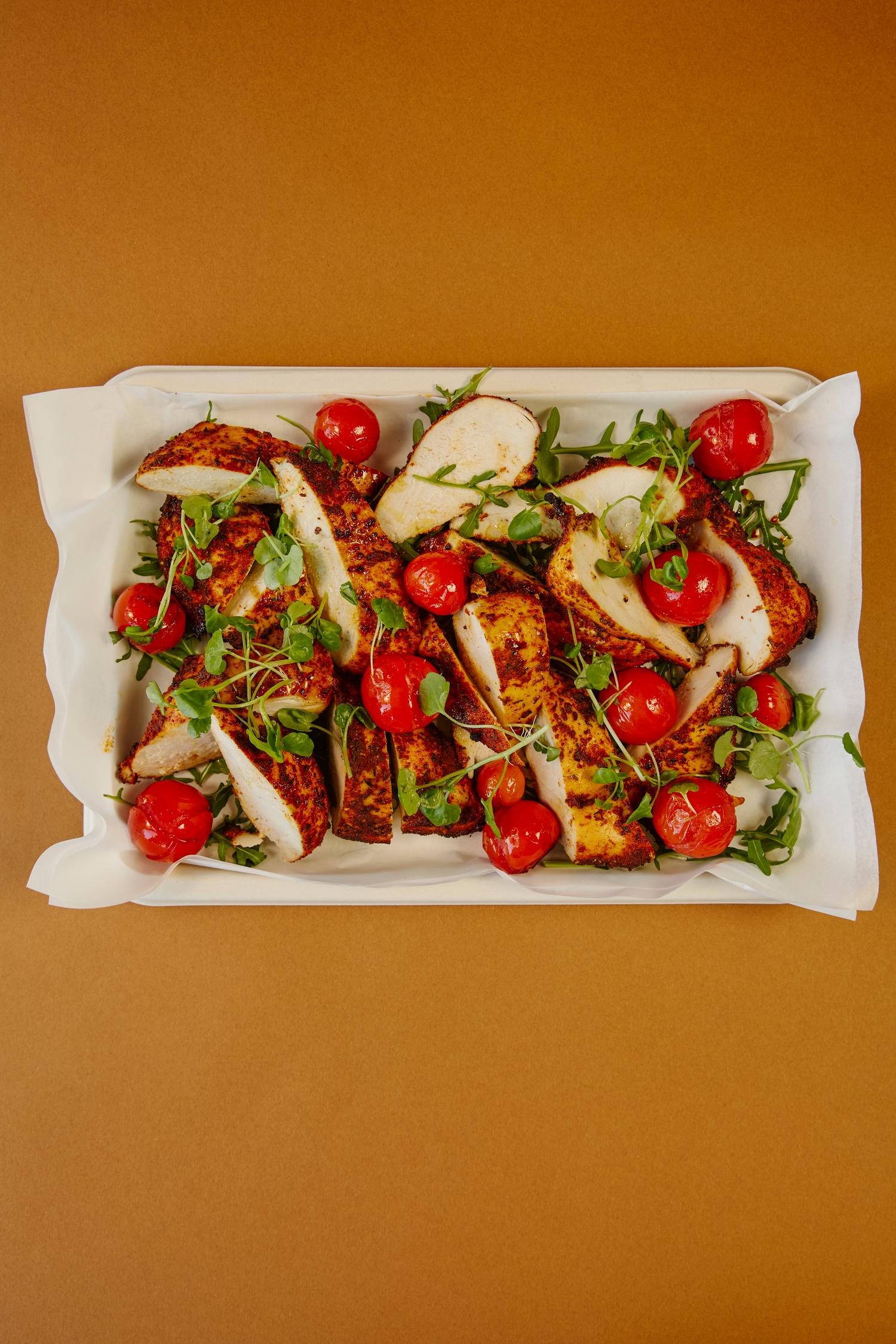 Harissa chicken, tomatoes & parsley platter