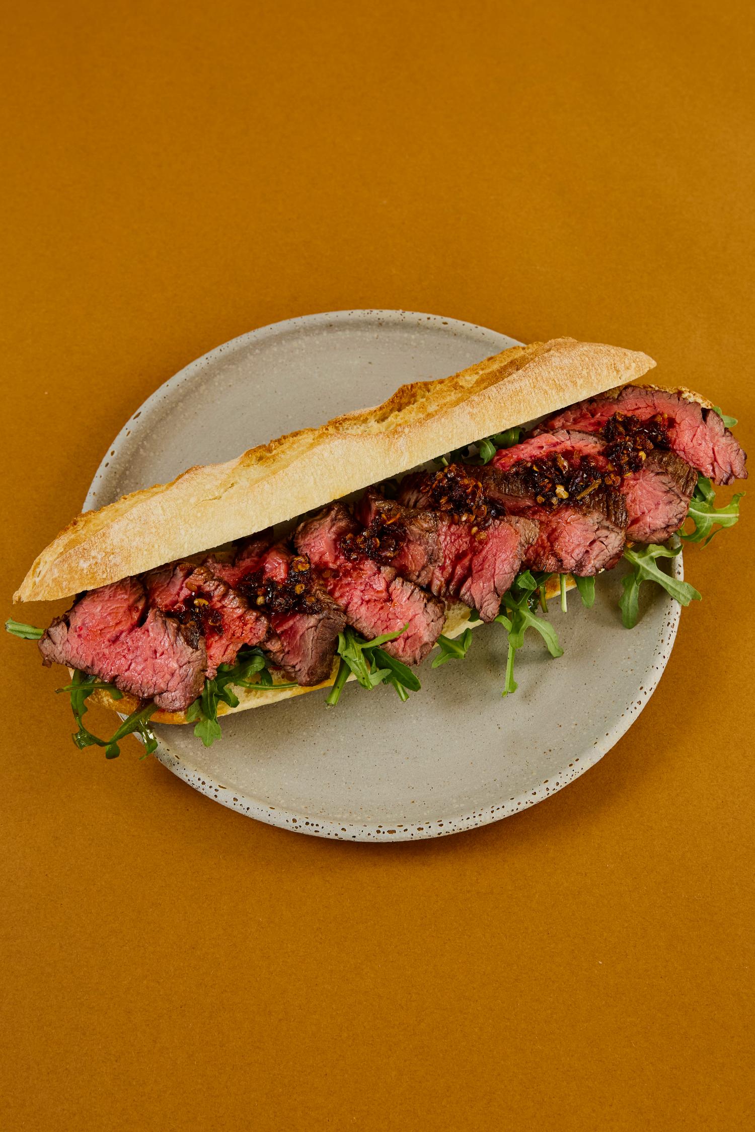 Bavette, harissa & rocket baguette  
