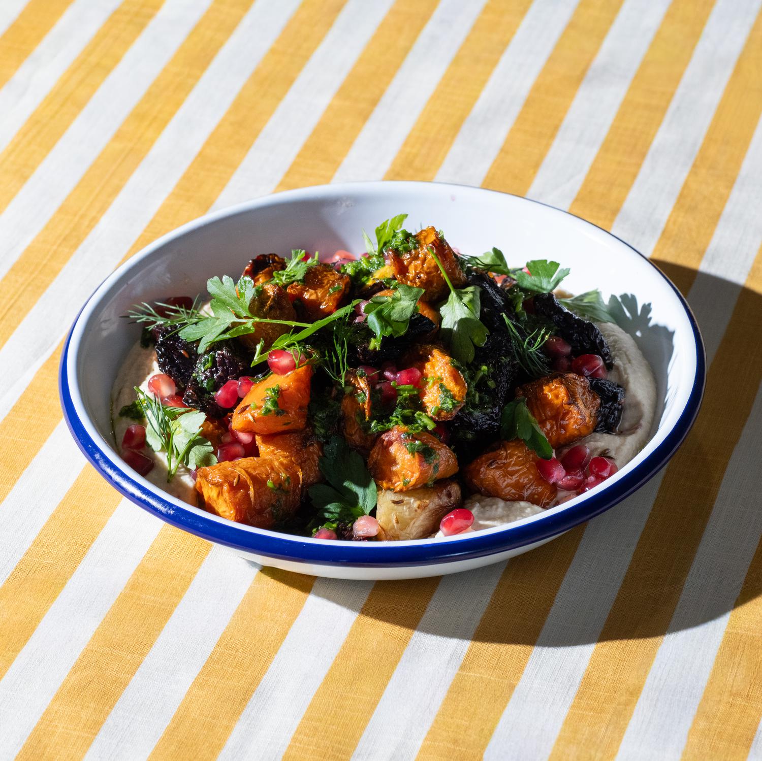 Roasted root veg, butterbean hummus & pomegranate