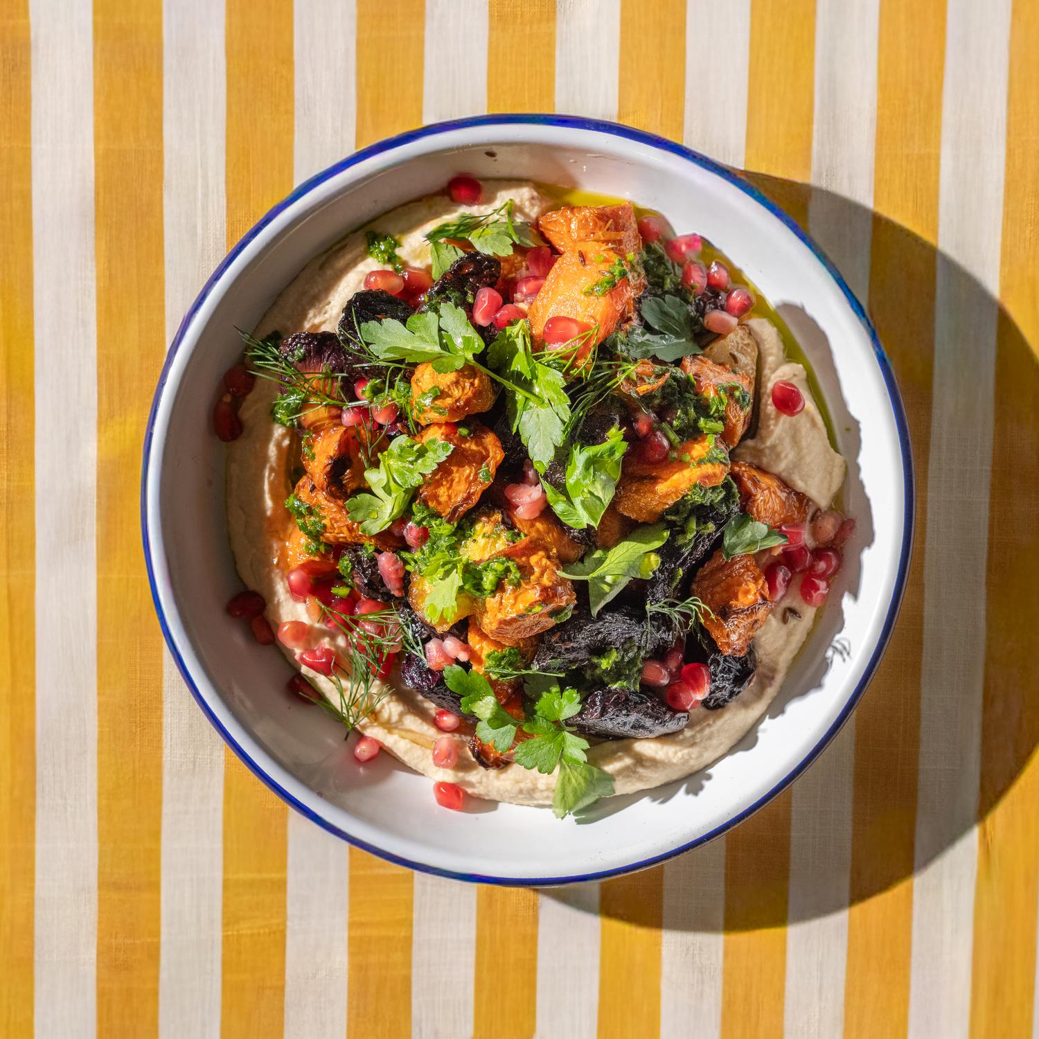 Roasted root veg, butterbean hummus & pomegranate