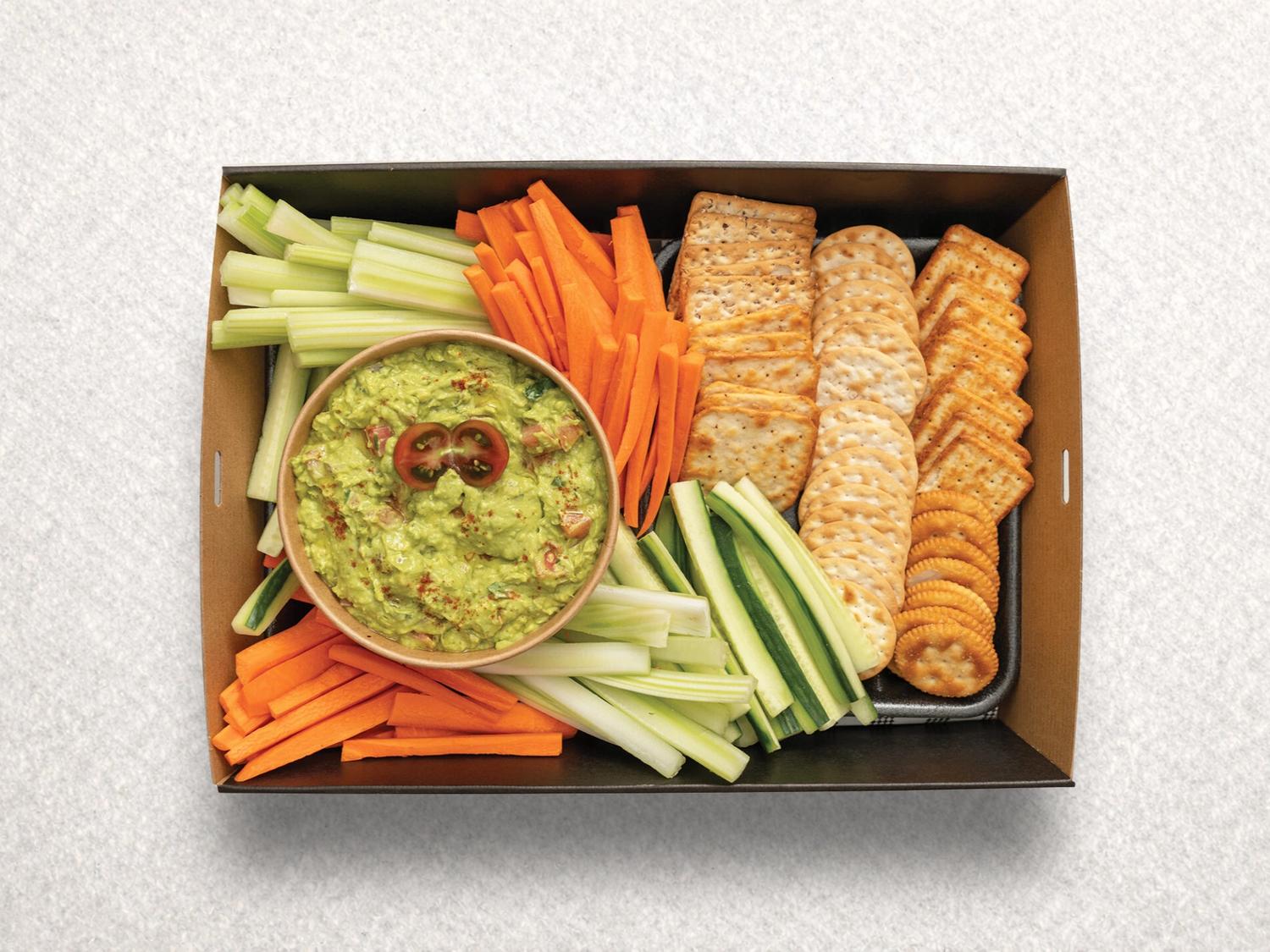 Guacamole Dip With Veggie Sticks and Crackers