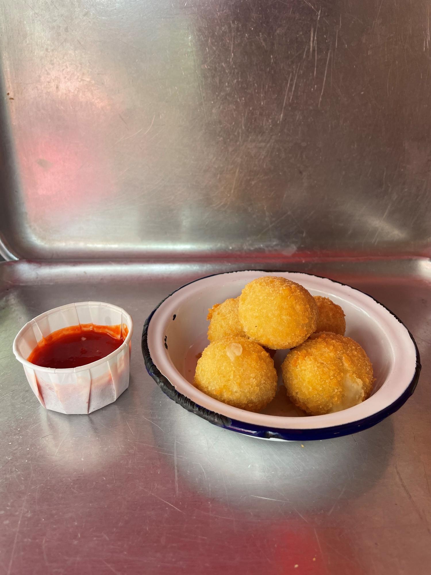 Cheese Balls with XXX Hot sauce