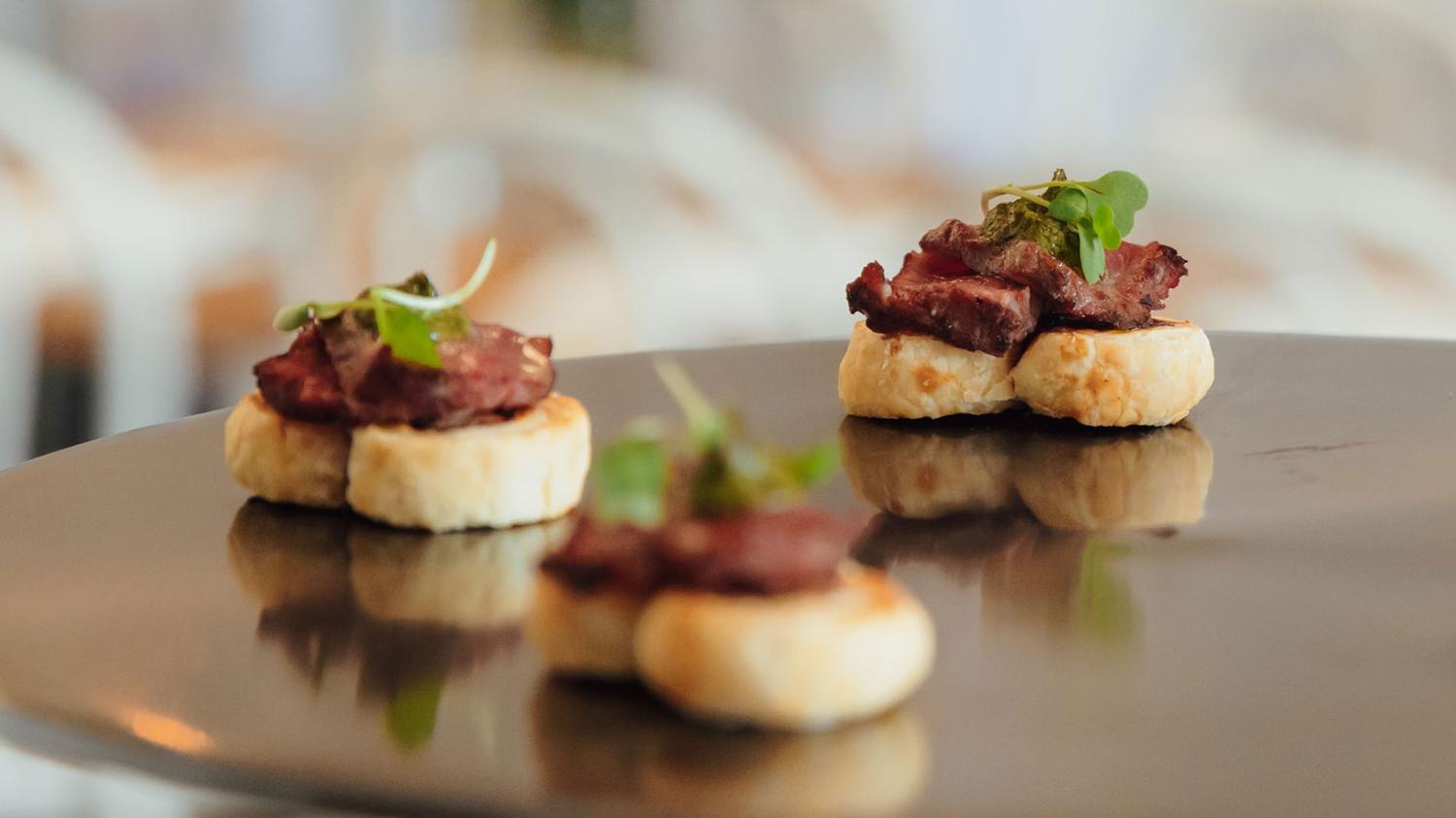 Canape | From The Land Peppered Eye Fillet on Red