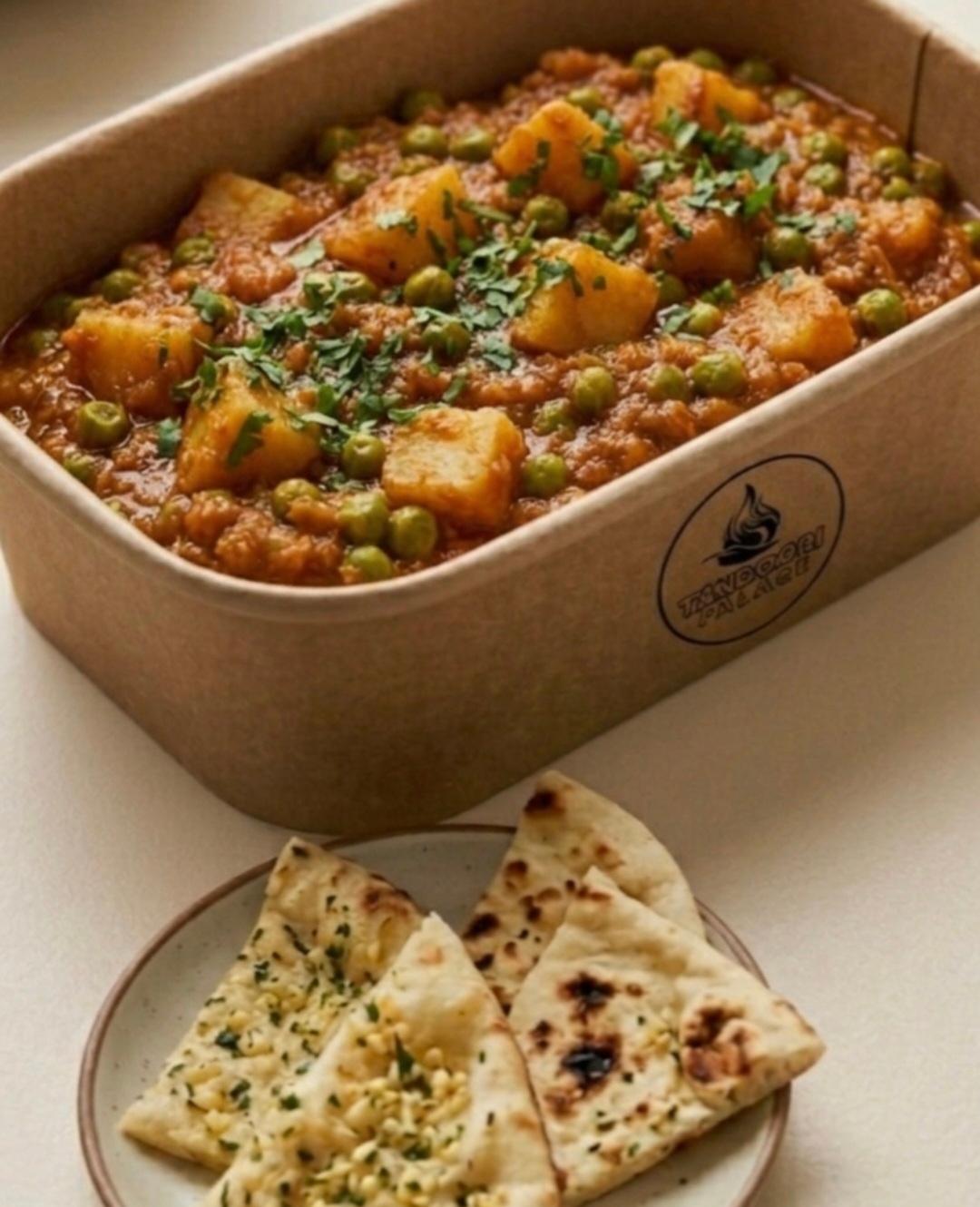 Aloo matter with Plain or Garlic Naan